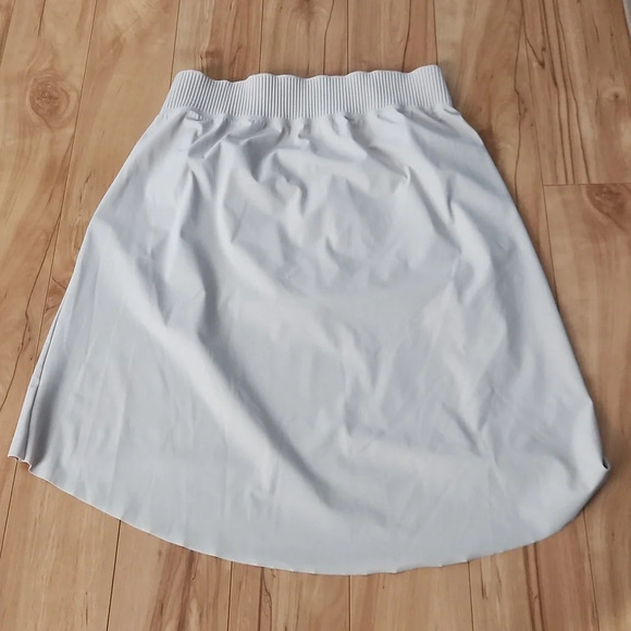 Athleta Cosmic hi-low knee - high beige skirt  size Medium - Picture 6 of 8